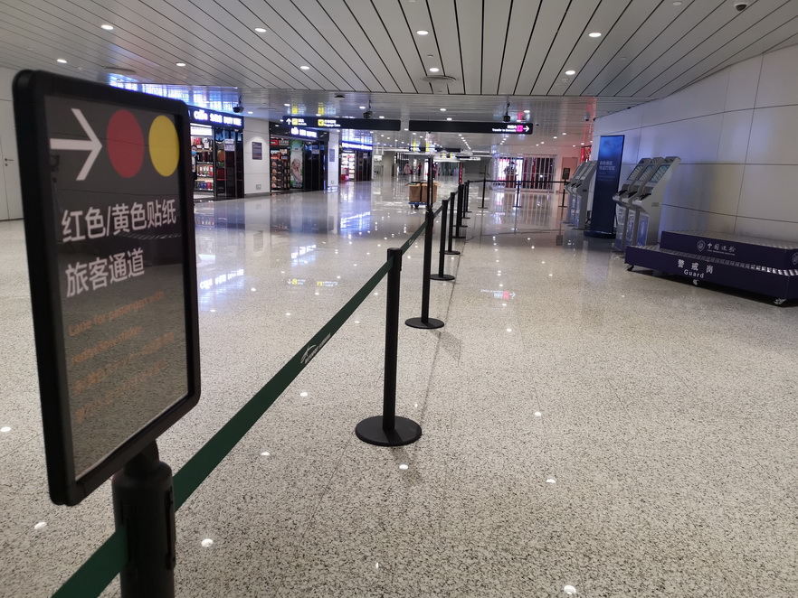 防控措施再升级!广州白云机场简化旅客分类标签为"红黄"二色
